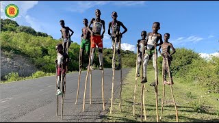 BANNA BOYS WALKING ON STILTS [upl. by Aubigny]